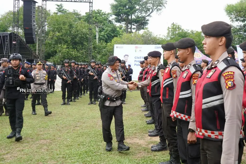 Kapolsek Kandis Hadiri Pesta Rakyat HUT RI ke-80 di Kelurahan Simpang Belutu